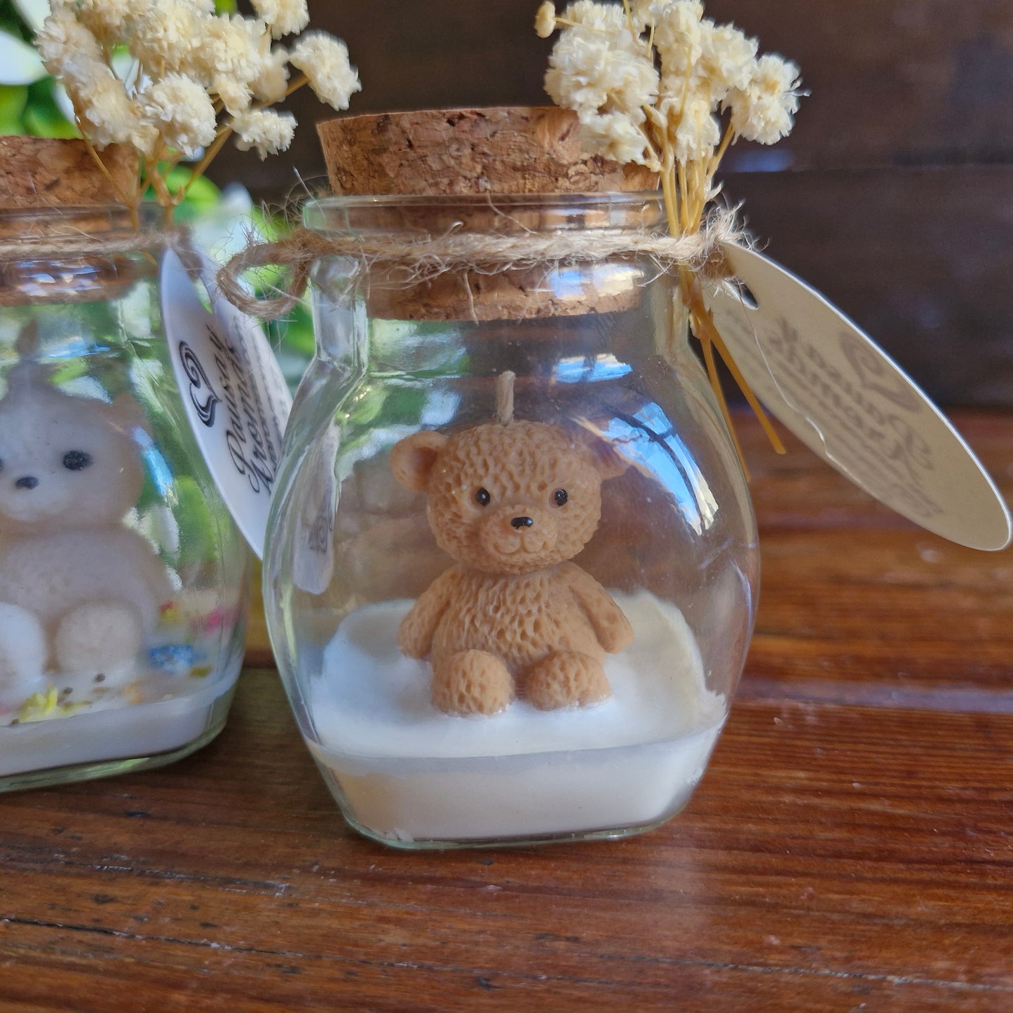 Vela decorativa aromática con osito en frasco con tapa de corcho