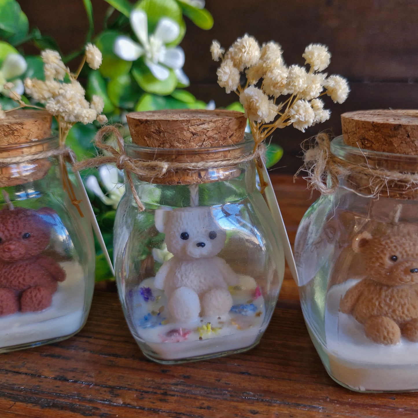 Vela decorativa aromática con osito en frasco con tapa de corcho