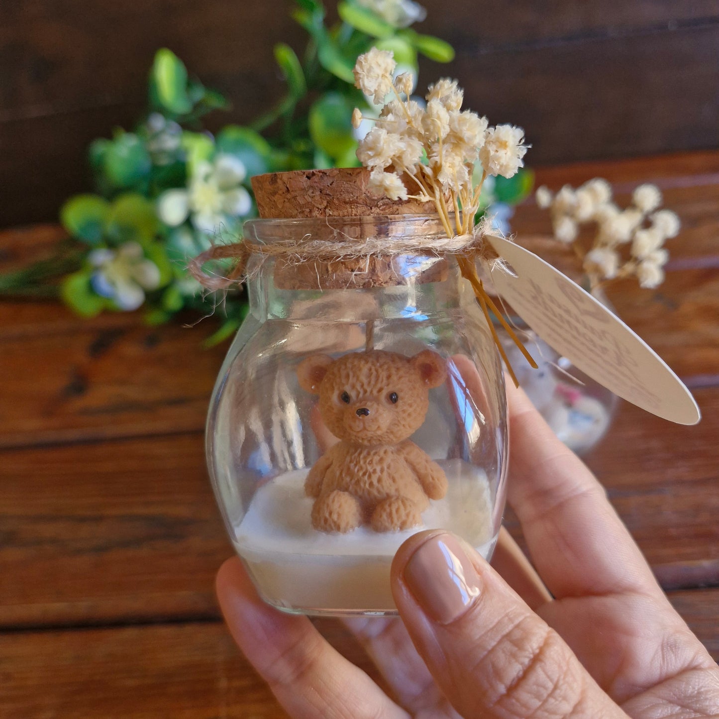 Vela decorativa aromática con osito en frasco con tapa de corcho