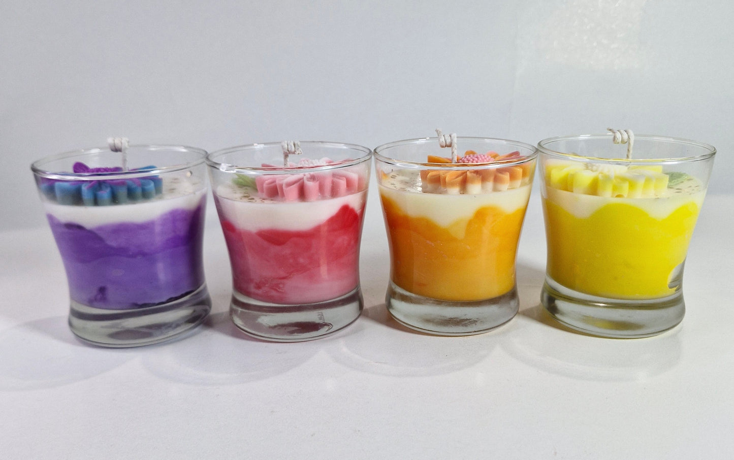 Pack 6 Velas aromáticas con flor marmoleada varios colores y aromas a elegir